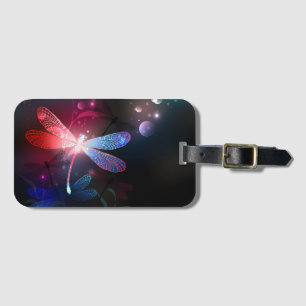Glowing red dragonfly luggage tag