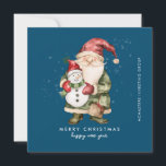 Gnome and Snowman Merry Christmas Businness Flat H Holiday Card<br><div class="desc">A gnome dressed in red stands beside a snowman in a green elf stocking hat and red scarf. They are surrounded by a dusting of white snow that pops on the dark blue background. The minimalist aesthetic is created with a simple Merry Christmas and Happy New Year below. The business...</div>