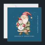 Gnome and Snowman Season's Greetings Business Flat Holiday Card<br><div class="desc">A gnome dressed in red and green stands beside a snowman in a red elf stocking hat and red scarf. They are surrounded by a dusting of white snow that pops on the dark blue background. The minimalist aesthetic is created with a simple Season's Greetings below and the business name...</div>