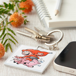 Gnome de dessin animé drôle chevauchant un cochon