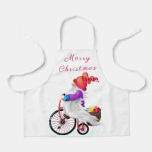 Gnome de Noël avec tablier vélo et cadeau