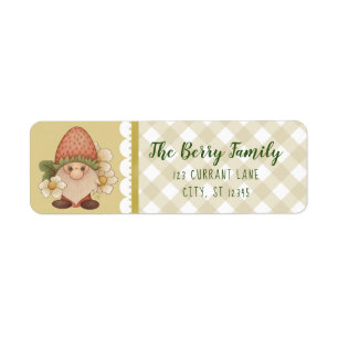 Gnome mignonne aux fraises de bois