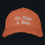 Go Take A Hike Outdoor Adventure  Embroidered Hat<br><div class="desc">This casual outdoor baseball cap features the phrase “Go Take A Hike” embroidered across the front in bold lettering. The warm rust-orange cap paired with simple white embroidery creates a clean and rugged outdoor style. The playful message celebrates hiking, nature, and time spent on the trail, making it perfect for...</div>