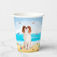 Chien roi cavalier sur la plage