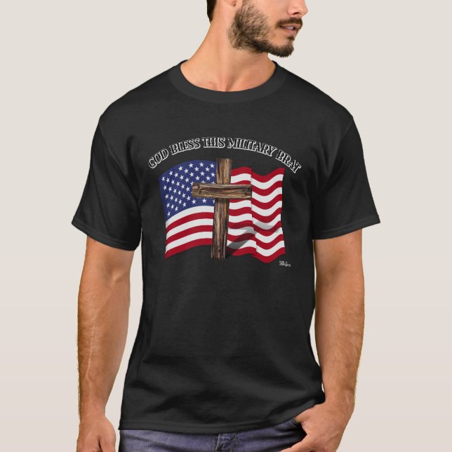 GOD BLESS THIS MILITARY BRAT rugged cross, US flag T-Shirt (Front)