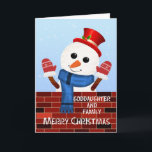 Goddaughter and her Family Christmas Snowman Holiday Card<br><div class="desc">Wish a Merry Christmas to your goddaughter and her family. Celebrate the holiday season with this delightful Christmas card showcasing a friendly snowman beside a wall decorated with cheerful chalk writing. Dressed in a red hat and gloves,  the snowman adds a playful and heartwarming touch to your festive greetings.</div>