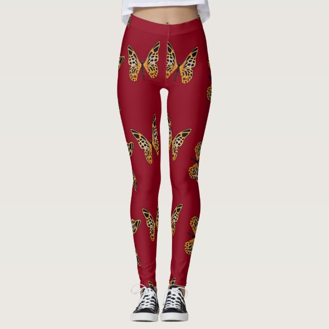 Gold and black butterflies on maroon leggings (Front)