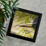 Gold and Black Feather Quill Pen wooden keepsake Gift Box<br><div class="desc">This wooden jewellery keepsake box with gold and black feather quill fountain pen reflected against a gold and green background is an ideal gift for the writer in your life. Personalize with initials, it is a unique gift to be treasured for keeping jewellery, keepsakes or treasures inside. A sophisticated style,...</div>