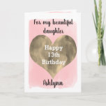 Gold and Pink 13th Birthday Daughter Card<br><div class="desc">A pretty pink and gold 13th birthday daughter card that features a beautiful gold heart against a pretty pink watercolor, which you can personalize underneath the heart with her name. The inside of this 13th birthday card reads a sweet sentiment for your daughter, which an be easily personalized. The back...</div>