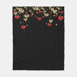 Gold and red hearts on black background fleece blanket