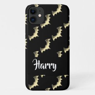 Gold bats on black iPhone 11 case