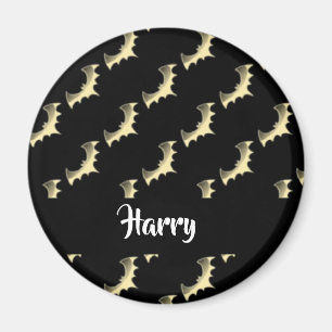 Gold bats on black magnet