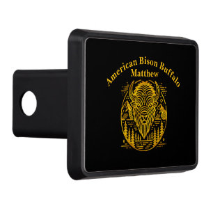 Gold Bison Amid Mountains and Trees Trailer Hitch Cover