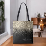 Gold Black Girly Glitter Sparkle Monogram Name Tote Bag<br><div class="desc">Black and Gold Faux Sparkle and Glitter Elegant Monogram Book Bag. This Book Bag can be customized to include your initial and first name and given as a gift for Christmas,  Sweet 16 Birthday,  Bridal Shower or a Wedding.</div>