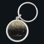 Gold Black Glitter Script Monogram Girly Name Keychain<br><div class="desc">Gold and Black Sparkle Glitter Script Monogram Name Keychains (Key Chain). This makes the perfect sweet 16 birthday,  wedding,  bridal shower,  anniversary,  baby shower or bachelorette party gift for someone that loves glam luxury and chic styles.</div>