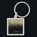 Gold Black Glitter Script Monogram Girly Name Keychain<br><div class="desc">Gold and Black Sparkle Glitter Script Monogram Name Keychains (Key Chain). This makes the perfect sweet 16 birthday,  wedding,  bridal shower,  anniversary,  baby shower or bachelorette party gift for someone that loves glam luxury and chic styles.</div>