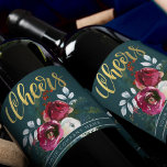 Gold Cheers Winter Roses Christmas Corporate Gift Wine Label<br><div class="desc">Personalized elegant holiday / Christmas seasonal wine label featuring red and white watercolor peony roses with winter foliage,  red berries and fir branches,  "cheers" gold typography script and your company name / custom text on a dark hunter blue green background .          Suitable for Christmas parties,   business / corporate gifts.</div>