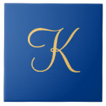 Gold-coloured initial K on dark blue background Tile<br><div class="desc">Gold-coloured initial K on dark blue background</div>