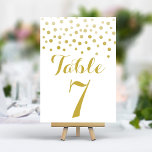 Gold Confetti Elegant Wedding Table Number Card<br><div class="desc">Add a touch of glamour and sparkle to your wedding reception with these elegant table numbers. Featuring a cascade of shimmering gold confetti on a crisp white background,  these cards create a modern and chic look. Easily personalize with your table numbers for a cohesive and unforgettable table setting.</div>