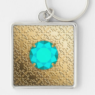 Gold Damask with a faux aquamarine gemstone Keychain