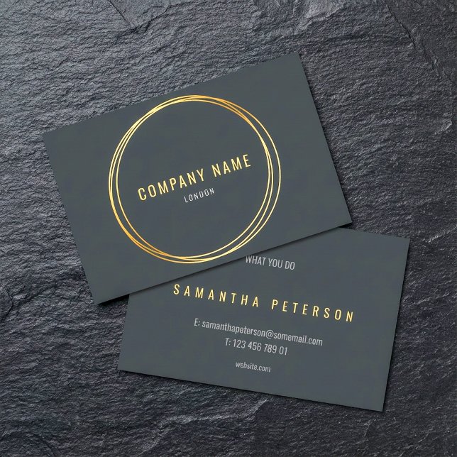 Gold effect, gold rings, dark grey bold text business card (Gold effect, gold rings, dark grey bold text business card.)