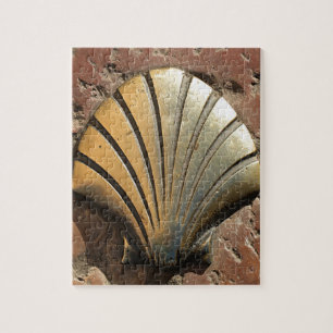 Gold El Camino shell sign, pavement, Leon, Spain Jigsaw Puzzle