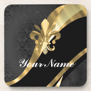 Gold fleur de lys on black coaster