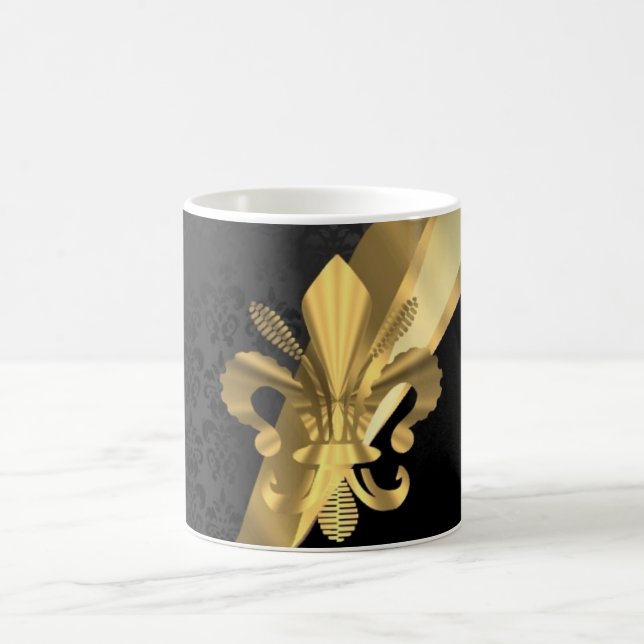 Gold fleur de lys on black coffee mug (Center)