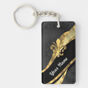 Gold fleur de lys on black keychain