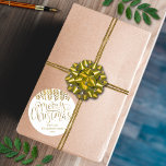 Gold Foil Effect Typography Merry Christmas Classic Round Sticker<br><div class="desc">Send out this year's holiday greetings in style with these unique and modern holiday stickers. The design features a festive gold foil effect typography script "Merry Christmas" with matching hanging foliage on a clean white background. These stickers can be used as envelope seals, Christmas gift tags, holiday party favour stickers,...</div>
