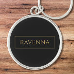 Gold Frame Personalized Name Deep Black Luxury Keychain<br><div class="desc">This personalized keychain features a deep black background with a custom name written in a classic gold serif font. A thin gold frame surrounding the name adds a refined detail that creates a clean luxury style. The black and gold palette gives the keychain a sophisticated and timeless look that works...</div>