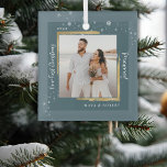 Gold Framed Photo Our First Christmas Married  Gla Glass Ornament<br><div class="desc">Modern brushed-gold framed wedding photo amid snowflakes,  with Our First Christmas Married in a festive white calligraphy script,  makes the perfect memento keepsake gift for the just married newlyweds this Christmas holiday season.  Easily customize your name and year of choice.</div>