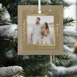 Gold Framed Photo Our First Christmas Married   Glass Ornament<br><div class="desc">Modern brushed-gold framed wedding photo amid snowflakes,  with Our First Christmas Married in a festive white calligraphy script,  makes the perfect memento keepsake gift for the just married newlyweds this Christmas holiday season.  Easily customize your name and year of choice.</div>