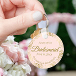 Gold Frills on Pink Bridesmaid Wedding Gift Keychain<br><div class="desc">These keychains are designed to give as favours to bridesmaids in your wedding party. They feature a simple yet elegant design with a pale blush pink coloured background, gold script lettering, and a lacy golden faux foil floral border. The text says "Bridesmaid" with space for her name, the names of...</div>