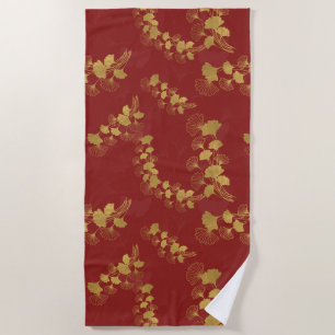 Gold Gingko Balboa Leaves on Dark Red Background Beach Towel