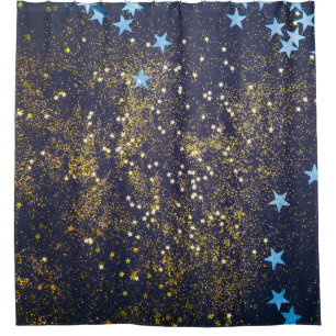 Gold glitter and glittering blue stars on black ba