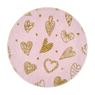 Gold glitter hearts: pink background pattern cutting board