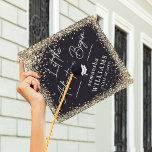 Gold Glitter Let the Adventure Begin Graduate  Graduation Cap Topper<br><div class="desc">Celebrate this momentous achievement with the ultimate personal touch – an elegant graduation cap topper. Featuring a rich black background with the radiant sparkle of gold faux glitter, this cap topper stands out in any crowd. With the poignant quote 'Let the Adventure Begin' emblazoned across it, it's a bold statement...</div>