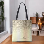 Gold Glitter Metal Monogram Glam Name Tote Bag<br><div class="desc">Gold Faux Sparkle and Dripping Glitter Metallic Stainless Steel Foil Elegant Monogram Book Bag. This Book Bag can be customized to include your initial and first name and given as a gift for Christmas,  Sweet 16 Birthday,  Bridal Shower or a Wedding.</div>