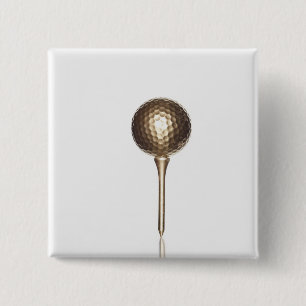 Gold golf ball and tee 2 inch square button