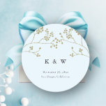 Gold Greenery Ice Blue Elegant Chic Winter Wedding Classic Round Sticker<br><div class="desc">An elegant, modern classic wedding sticker, featuring two hand-drawn branches of winter greenery layered digitally with a gold hue and an ice blue background. A lovely choice for a winter wedding, a Christmas wedding, a New Year wedding or a wedding in the cold months - November, December, January, February. Part...</div>