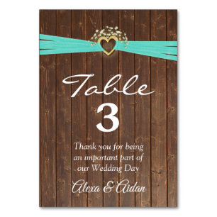 Gold Heart with Turquoise Ribbon On Barn Wood Table Number