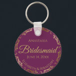 Gold Lace Bridesmaid Wedding Gift Cassis Purple Keychain<br><div class="desc">These keychains are designed to give as favours to bridesmaids in your wedding party. They feature a simple yet elegant design with a cassis purple, magenta, or berry coloured background, gold lettering, and a golden faux foil floral lace border. Perfect way to thank your bridesmaids for being a part of...</div>