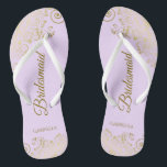 Gold Lace Elegant Lilac Purple Bridesmaid Wedding Flip Flops<br><div class="desc">These elegant wedding flip flops are a great way to thank and recognize your bridesmaids, while giving their feet a rest after a long day. The beautiful design features an elegant design with golden lace frills on a lilac, lavender, or pale purple coloured background and fancy gold coloured script lettering....</div>