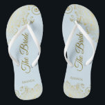 Gold Lace on Powder Blue The Bride Elegant Wedding Flip Flops<br><div class="desc">Dance the night away with these beautiful wedding flip flops. Designed for the bride, they feature a simple yet elegant design with gold coloured script lettering on a light powder blue background and fancy golden lace curls and swirls. Beautiful way to stay fancy and appropriate while giving your feet a...</div>