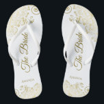 Gold Lace on White The Bride Elegant Wedding Flip Flops<br><div class="desc">Dance the night away with these beautiful wedding flip flops. Designed for the bride, they feature a simple yet elegant design with gold coloured script lettering on a white background and fancy golden lace curls and swirls. Beautiful way to stay fancy and appropriate while giving your feet a break after...</div>