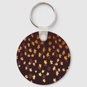 Gold Maple Leaf on dark red Keychain