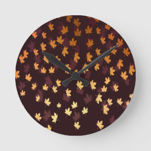 Gold Maple Leaf on dark red Round Clock