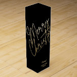 Gold Merry Christmas Black Wine Box<br><div class="desc">Merry Christmas in a faux gold foil script and your names in chic lettering, these black wine bottle gift boxes are a stylish way to package wine Christmas gifts.</div>