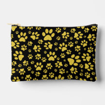 Gold metal pattern paws on black background
